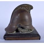 AN ANTIQUE BRONZE FIRE BRIGADE PAPERWEIGHT. 14 cm x 14 cm.