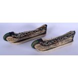 A PAIR OF EARLY 20TH CENTURY CHINESE SILKWORK EMBROIDERED SHOES Late Qing. 21 cm long.