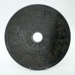 A large Chinese Bi Disc decorated with animals. 30cm.