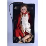 AN ADOLPH WISLZENUS BISQUE HEADED DOLL. 56 cm long.