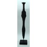 A Chinese bronze sword on a stand. 35cm. (2).