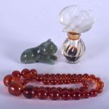 A FRENCH LALIQUE GLASS SCENT BOTTLE together with a jade cat. (3)