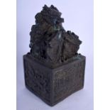 A CHINESE BRONZE DRAGON SEAL 20th Century. 14 cm x 7 cm.