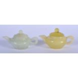 TWO CHINESE HARDSTONE TEAPOTS 20th Century. Largest 7 cm wide. (2)