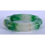A CHINESE JADE BANGLE 20th Century. 7.5 cm wide.
