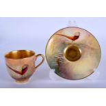 Royal Worcester coffee cup and saucer painted with golden pheasants by Sedgley, signed, date mark 19