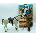 A vintage boxed model of Silver from the Lone Ranger and an Action man (2).