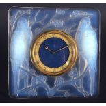 AN ART DECO FRENCH RENE LALIQUE GLASS CLOCK Designed 1926, Inseparables, moulded with birds. 11.5 cm