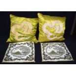 A pair of Chinese Silk cushions decorated with a dragon together with two other covers 50 x 50 cm (4
