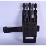 AN EARLY 20TH CENTURY AFRICAN DOGON TRIPLE FIGURE DOOR LOCK. 45 cm x 40 cm.