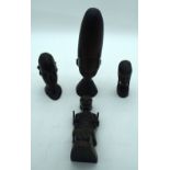 A collection of African hardwood figures 24cm (4).