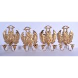 A RARE SET OF FOUR CONTEMPORARY GILT BRONZE BAT WALL SCONCES modelled holding branches in its mouth.