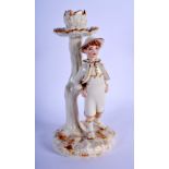 Royal Worcester Hadley style white glaze and gilt candlestick figure of a boy, date mark 1888. 19.5
