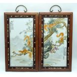 A pair of framed Chinese Porcelain panels decorated with Squirrels in a landscape 37 x 17cm (2)