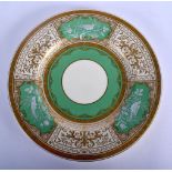 Minton Limoges enamel plate painted with alternating panels of painted birds and raised gilding. 27