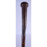 A 19TH CENTURY CONTINENTAL CARVED FULL LENGTH HORN WALKING CANE with leather wrap. 80 cm long.