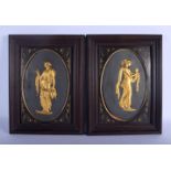 A PAIR OF 19TH CENTURY FRENCH GILT METAL CARVED WOOD PLAQUES in the manner of Barbedienne. 36 cm x 2