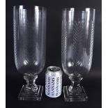 A LARGE PAIR OF CUT GLASS STORM CELERY VASES. 34 cm high.