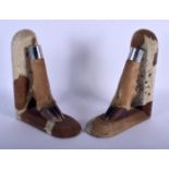 A PAIR OF 19TH CENTURY TAXIDERMY ANIMAL FOOT BOOK ENDS. 24 cm x 15 cm.