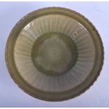 A 17TH/18TH CENTURY CHINESE CELADON BARBED POTTERY DISH Ming/Qing. 26 cm diameter.