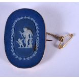 AN ANTIQUE WEDGWOOD BLUE BASALT BROOCH. 10 grams. 4 cm x 2.75 cm.