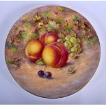 Royal Worcester plate painted with peaches and grapes by J. Freeman, signed, date mark 1947. 26.5cm