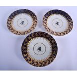 Late Chamberlain/early Grainger set of three crested plates painted with a bear with a spear. 21cm