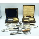A collection of boxed plated bone handled flatware.(Qty).