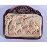 A CHINESE CARVED BONE AND BOXWOOD PLAQUE 20th Century. 6 cm x 5 cm.