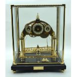 A Congreve Rolling ball clock 29cm x 25cm.