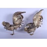 A LARGE PAIR OF 19TH CENTURY CONTINENTAL SILVER TABLE COCKERELS of naturalistic form. 1380 grams. 29