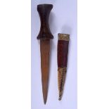AN ANTIQUE NORTH AFRICAN CARVED RHINOCEROS HORN HANDLED KNIFE. 26 cm long.