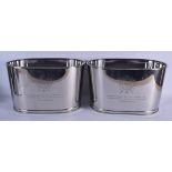 A LARGE PAIR OF CONTEMPORARY SILVER PLATED WINE COOLERS. 30 cm x 35 cm.