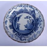 AN 18TH CENTURY JAPANESE EDO PERIOD BLUE AND WHITE BARBED DISH painted with figures and flowers. 32