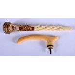 AN ANTIQUE 9CT GOLD AND IVORY PARASOL HANDLE and another. Largest 17 cm long. (2)