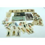 A collection of Wills and Players Cigarette cards, BDV silks and watercolour postcards Qty. Wear