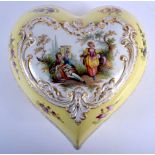 AN EARLY 20TH CENTURY DRESDEN HEART SHAPED PORCELAIN BOX AND COVER painted with lovers within landsc
