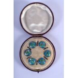 A CASED SET OF SIX SILVER AND ENAMEL BUTTONS. 13 grams. 1.5 cm diameter. (6)