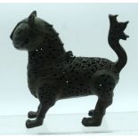 A Bronze Islamic open work Incense burner in the form of a dog. 19 x 17cm.