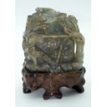 A Chinese Fluorite mountain group on a stand 12 x 10cm (2).