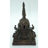 A Tibetan Bronze Incense burner in the form of a lidded Temple 22cm. (2).