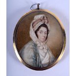 AN ANTIQUE EUROPEAN PAINTED IVORY PORTRAIT MINIATURE. 7 cm x 5.5 cm.