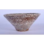 A CHINESE CRACKLE GLAZED PORCELAIN BOWL 20th Century. 7 cm diameter.