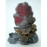 A Chinese Chicken blood stone carving 16cm .