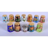 TWELVE CHINESE CLOISONNE ENAMEL THIMBLES 20th Century. 4 cm high. (12)