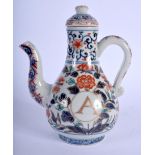 A RARE 18TH CENTURY JAPANESE EDO PERIOD IMARI KAKIEMON PORCELAIN EWER painted with flowers and an in