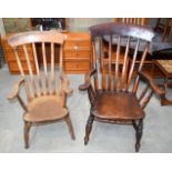 A large oak Captains broad arms chair together with another Winsor 112 x 73 x 65 cm (2).