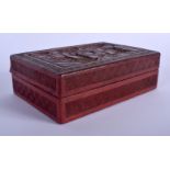 A 19TH CENTURY CHINESE CARVED CINNABAR LACQUER BOX AND COVER decorated with figures in various pursu