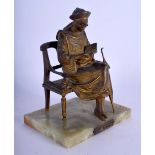AN ANTIQUE FRENCH BRONZE AND ONYX FIGURE En Lecture. 13 cm x 9 cm.