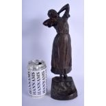 AN ART NOUVEAU EUROPEAN BRONZE FIGURE OF A FEMALE modelled upon a stepped base. 30 cm high.